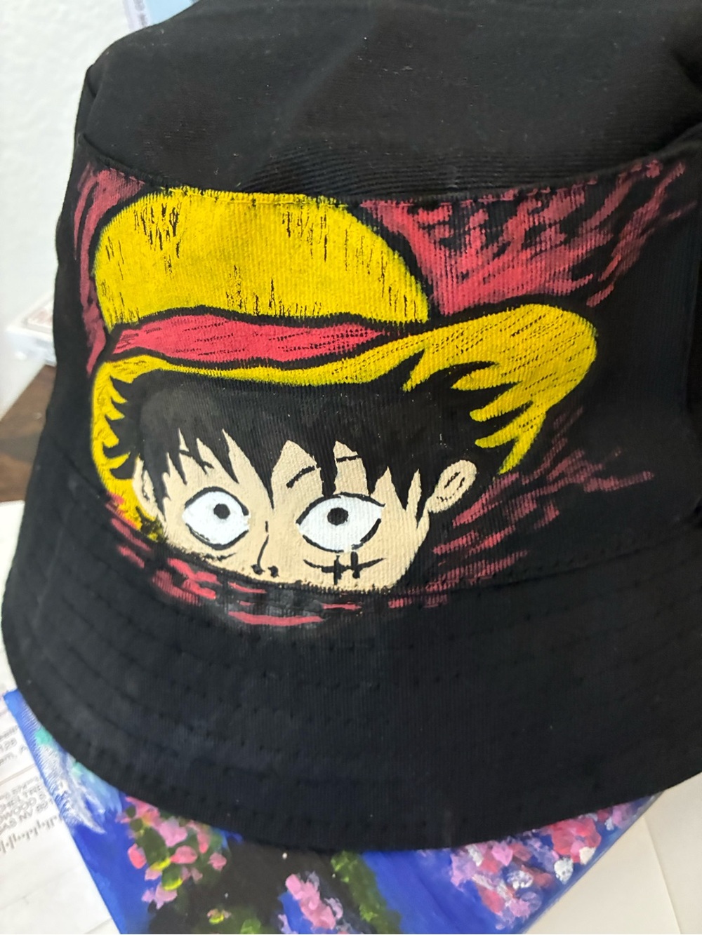 Black Bucket Hat with Yellow & Red Graphic
